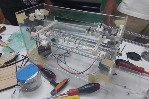 A BrailleRAP with a transparent chassis being assembled.