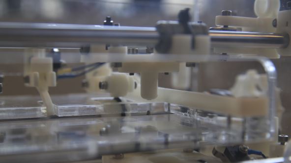 A detailed view of the inside of a BrailleRAP. The punch and anvil of version 6.5 can be seen.