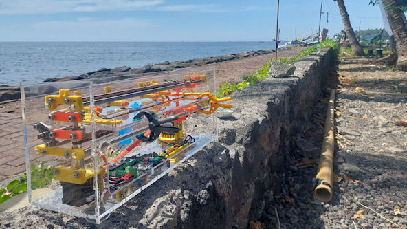 A BrailleRAP in the sun to allow the UV glue to polymerize.