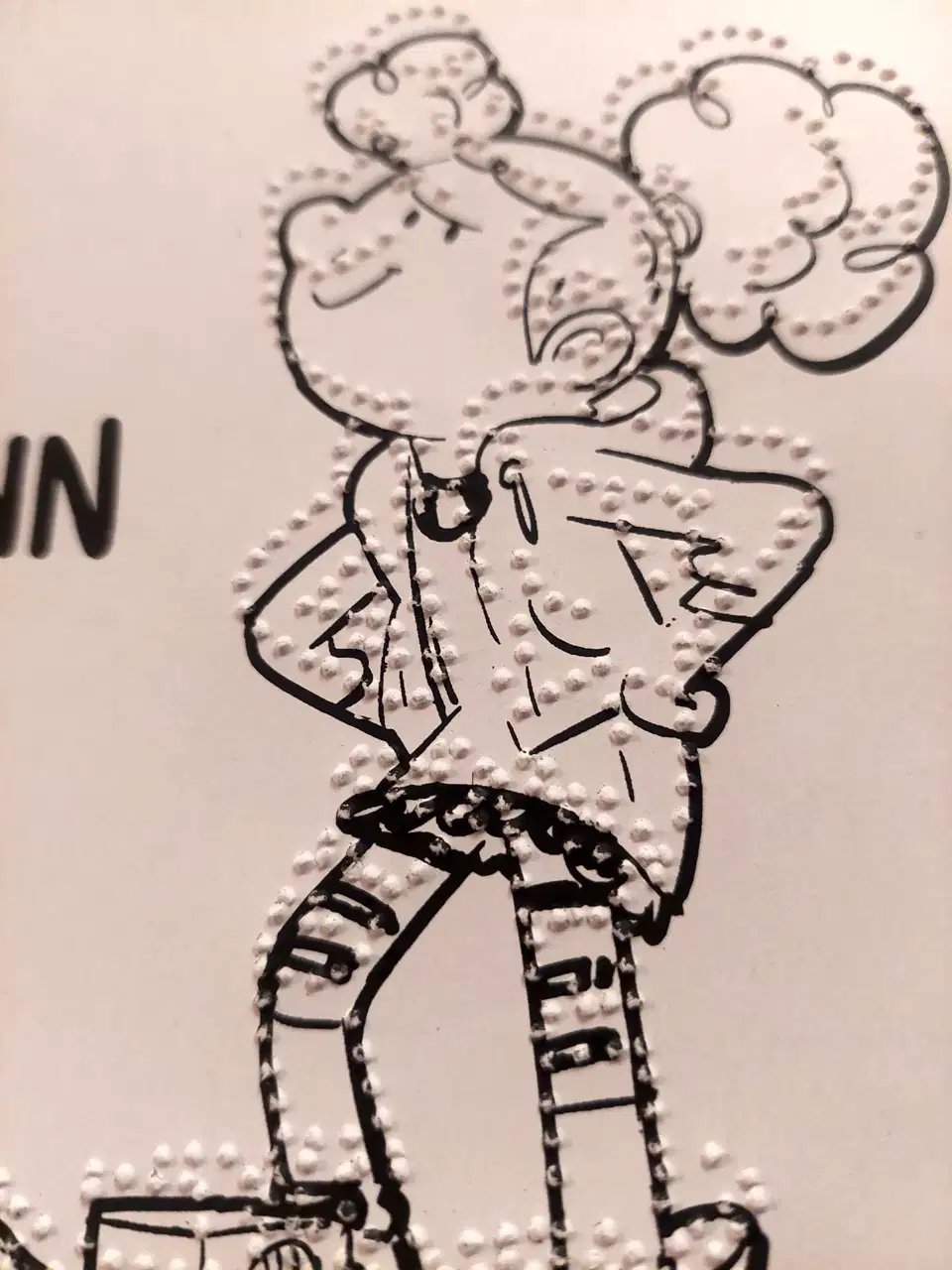 Ada detail view printed and embossed