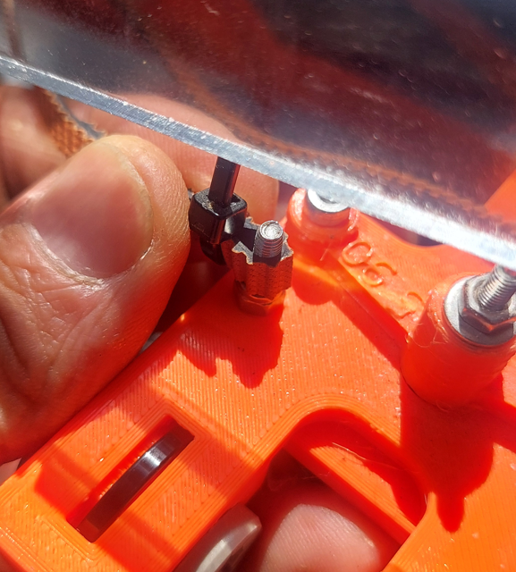 Attaching the belt to bottom carriage