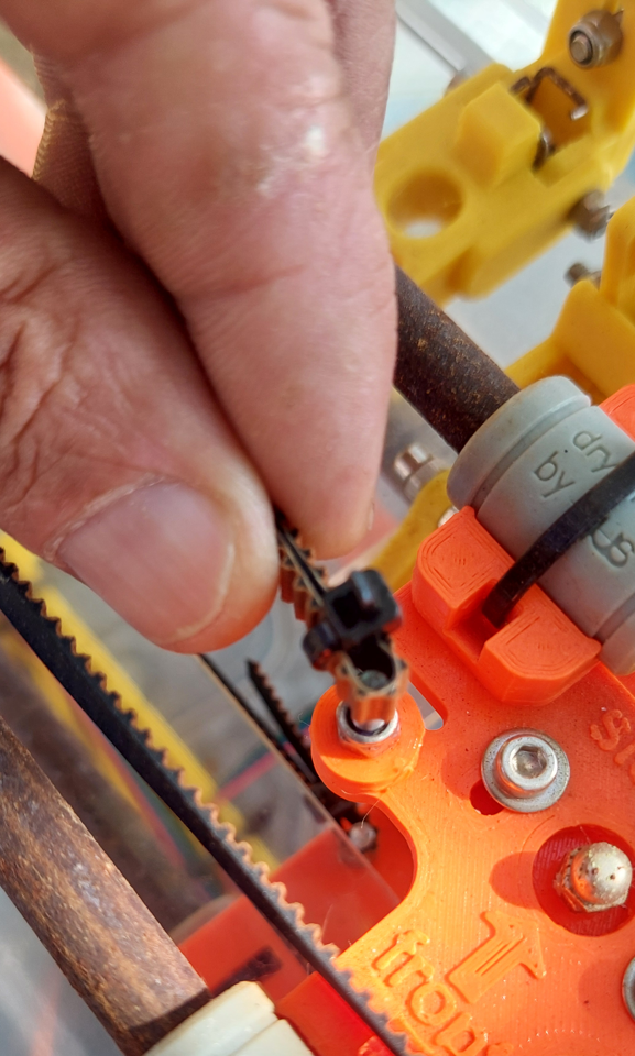 Removing top carriage belt